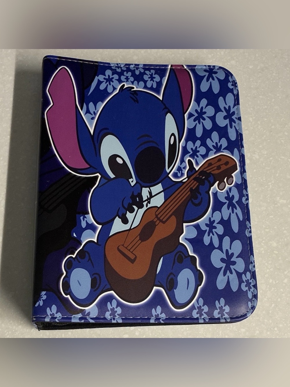 Disney Stitch Blue and Pink Floral Guitar Print binder capacity for 400 cards